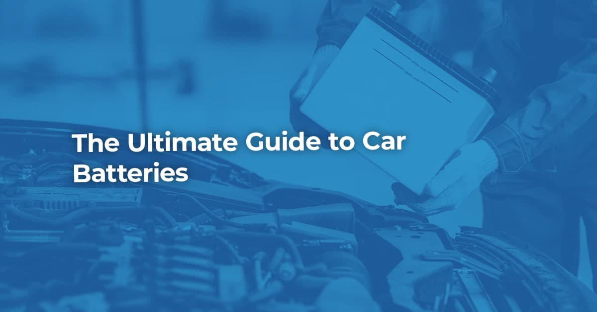 The article title over someone replacing the battery in their car, in a blue overlay.