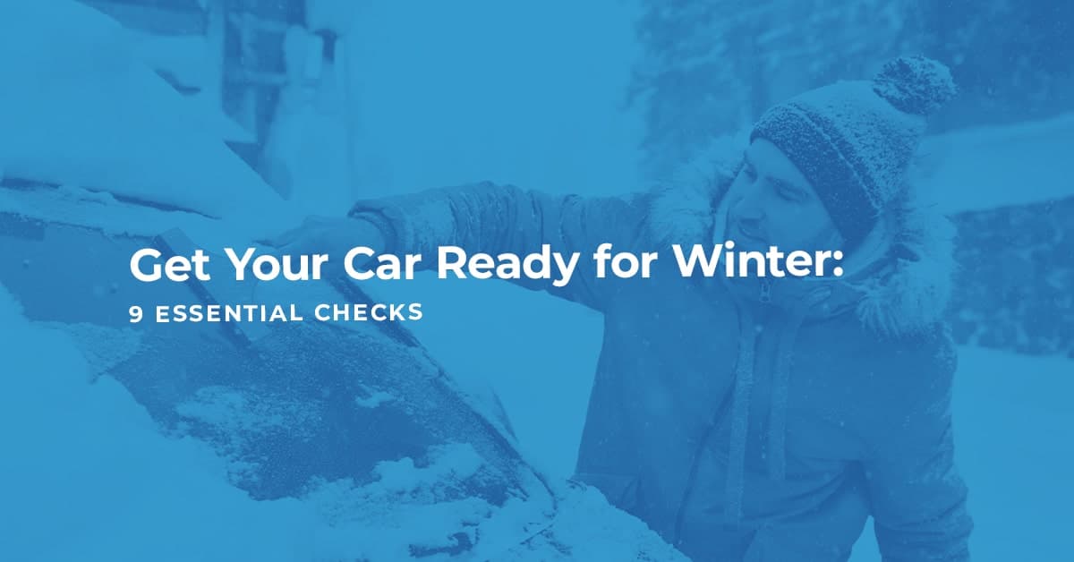 The article title over a man dressed in a coat wiping snow from his car in winter.