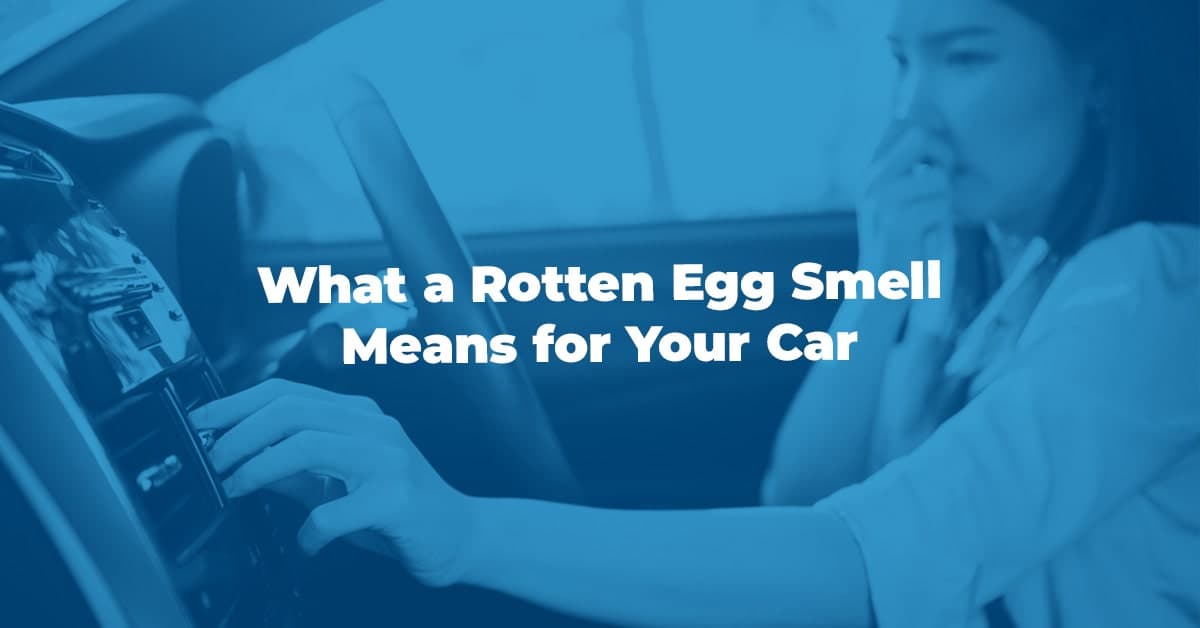 The article title over a woman holding her nose in her car because of a rotten egg smell.
